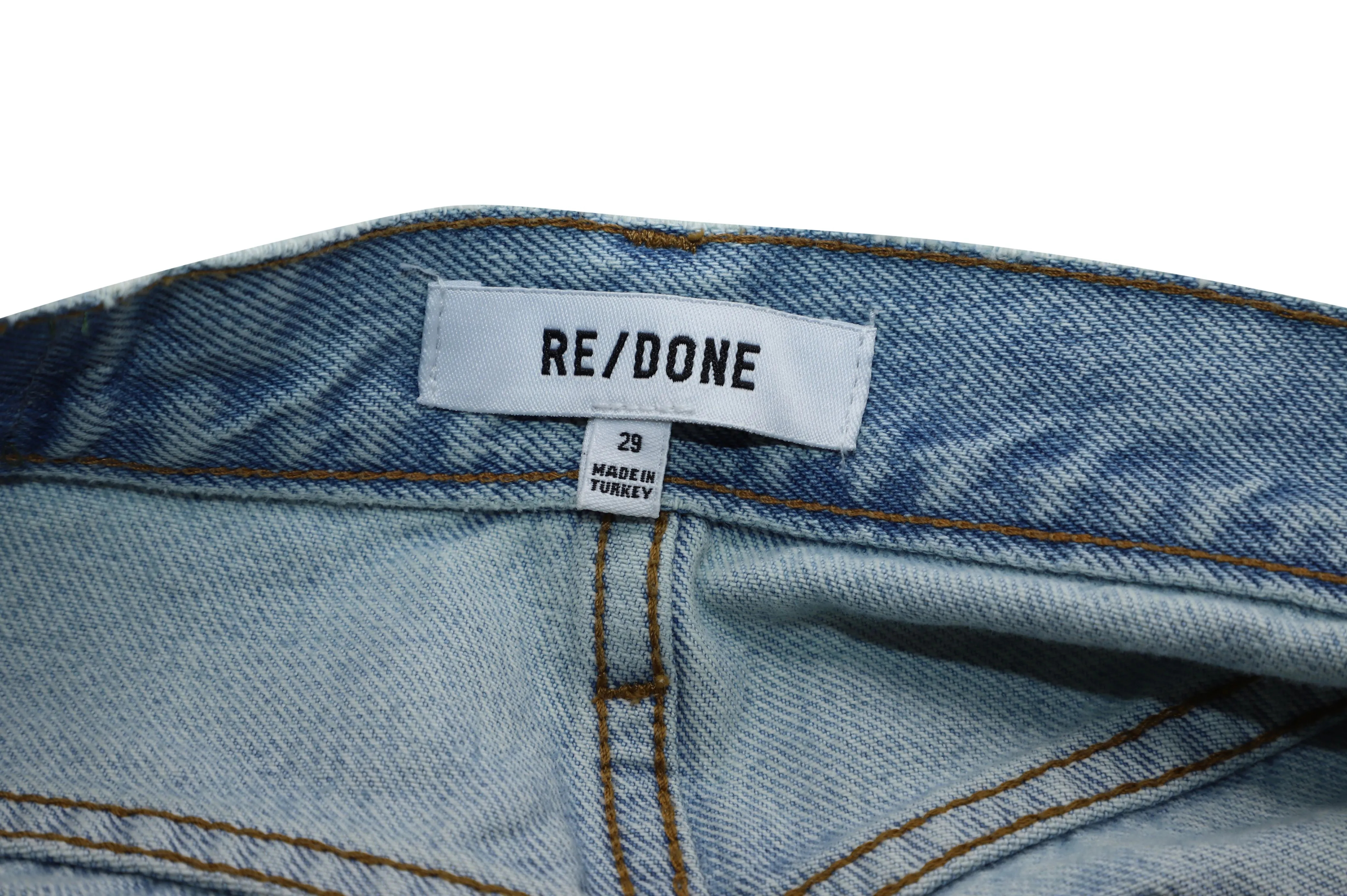 Re/Done Distressed Cropped Boyfriend Jeans in Blue Cotton Denim